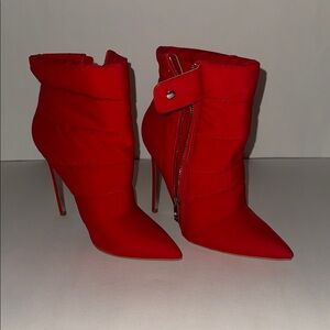 Jennifer Lopez Red Heeled Boots with Stiletto Elegance